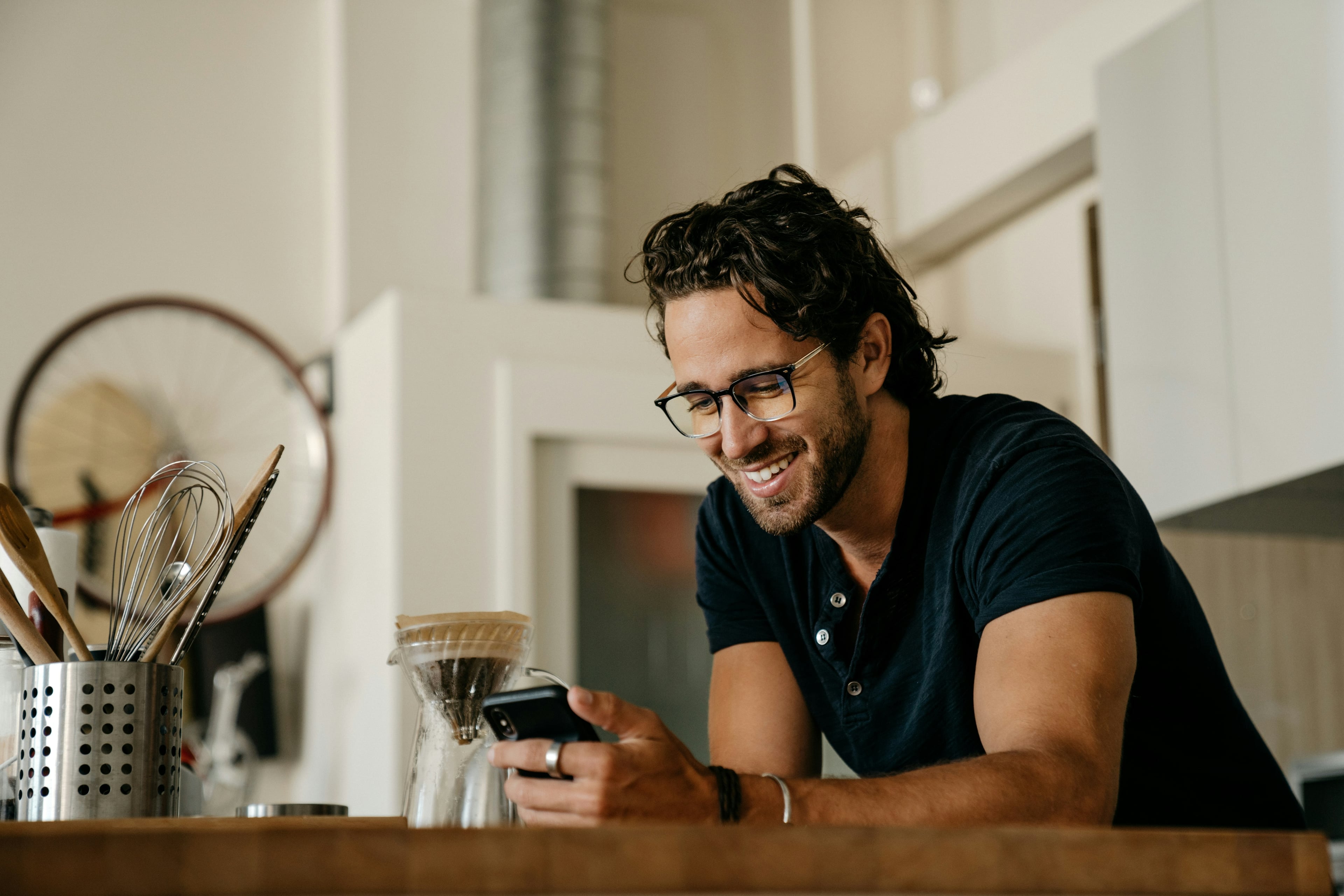 Student smiling at his phone after a Doccy consult